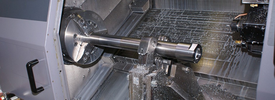 CNC drejning af aksler i brille.